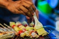 Closeup steak shishkabob skewers cooking on flaming grill. Variety of Shish Kebab From Different Meat With Pepper And Tomato On Royalty Free Stock Photo