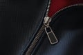 Closeup of steel zipper on leather jacket