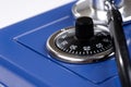 Closeup stethoscope and closed blue safe