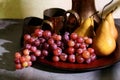 Closeup still life grapes and bosc pears Royalty Free Stock Photo