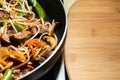 Closeup of Stir-fry in a skillet being Cooking to perfection. Royalty Free Stock Photo