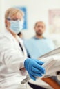 Closeup of stomatologist doctor preparing dental tools for stomatology surgery