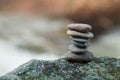Stone balance on rock in border river Royalty Free Stock Photo