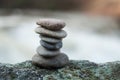 stone balance on rock in border river Royalty Free Stock Photo