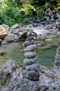 Stone balance on rock in the river Royalty Free Stock Photo