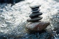 Stone balance on rocks in the river Royalty Free Stock Photo