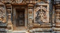 A closeup of a stonecarved doorway featuring intricate details and a handcrafted door