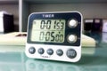 Closeup stop watch in laboratory. Timer. Laboratory test time counting concept by Stopwatch.