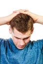 Closeup stressed man holds head with hands Royalty Free Stock Photo