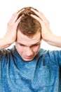 Closeup stressed man holds head with hands Royalty Free Stock Photo