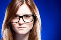 Closeup strict young woman with nerd glasses Royalty Free Stock Photo