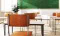 Closeup student chair back seat and desk in classroom background with on wooden floor. Education and Back to school concept.