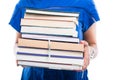 Close-up of student girl holding bunch of books