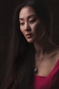 Closeup studio portrait of beautiful Asian woman