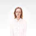 Closeup studio portrait of freckled woman without makeup