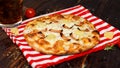 Closeup studio shot hot oven baked tasty delicious Italian homemade ham pineapple traditional Hawaiian bread crust round pizza Royalty Free Stock Photo