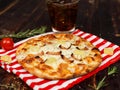 Closeup studio shot hot oven baked tasty delicious Italian homemade ham pineapple traditional Hawaiian bread crust round pizza Royalty Free Stock Photo