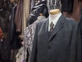 Closeup of stylish suits for men on mannequins in a shop