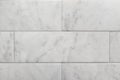 Closeup of subway tile carrara marble wall background Royalty Free Stock Photo