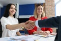 Closeup of successful business people handshake in office Royalty Free Stock Photo