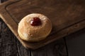 Sufganiyah, Jewish donut eaten on Hanukkah Royalty Free Stock Photo