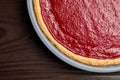 Closeup of summer strawberry pie in baking dish on wooden table background Royalty Free Stock Photo