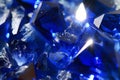 closeup of sunlight hitting sapphires facets