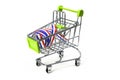 Closeup on supermarket shopping cart isolated with a French tricolor ribbon Royalty Free Stock Photo