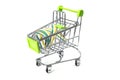 Closeup on supermarket shopping cart isolated with a Irish tricolor ribbon Royalty Free Stock Photo