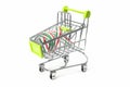 Closeup on supermarket shopping cart isolated with a Italian tricolor ribbon Royalty Free Stock Photo