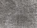Closeup surface abstract fabric pattern at the black fabric carpet at the floor of house textured background in black and white to Royalty Free Stock Photo
