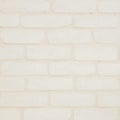Closeup surface brick wall pattern at cream color brick wallpaper wall textured background