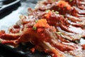 Closeup Sushi pork bulgogi with korean sauce on black plate background. Korean foods concept Royalty Free Stock Photo