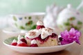 Closeup on sweet cake with cup of tea on wooden table Royalty Free Stock Photo