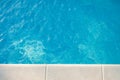 Closeup of swimingpool with clean blue water summer background Royalty Free Stock Photo