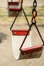 Closeup of swing in a children play area at park Royalty Free Stock Photo