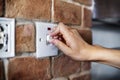 Closeup of switch on brick wall Royalty Free Stock Photo