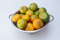 Closeup of tableware with fresh ripe mandarines