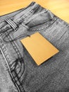 Closeup tag price on black grey jeans Royalty Free Stock Photo