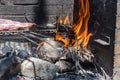 Closeup take of a traditional Argentinian and Uruguayan barbecue, Creole sausage, whit peppers and eggs