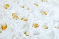 Closeup of tapioca starch or powder flour with corn grains on a white background. Texture of corn starch with grains Royalty Free Stock Photo