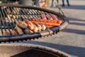 Closeup of tasty grilled sausages outdoors Royalty Free Stock Photo