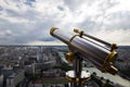 Closeup telescope on the background of Paris and the Seine River