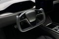 Closeup of a Tesla Model S Plaid Steering yoke