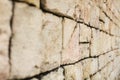 Closeup texture of brick aged wall in sand color outdoor Royalty Free Stock Photo