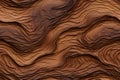 Closeup textured background of dry brown wood with wavy lines and cracks. Wood grain seamless pattern