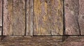 Closeup of textured old boards shows weather, unpainted, or peeled paint. Royalty Free Stock Photo