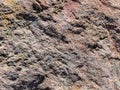 textured surface of rough rocky formation as abstract background Royalty Free Stock Photo