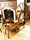 A closeup of an 18th century spinning wheel.