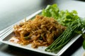 Closeup Thai food spicy salad oyster with fried garlic and vegetable Royalty Free Stock Photo